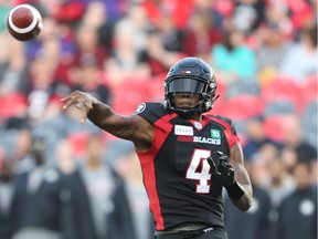 Dominique Davis throws a pass in the first half as the Ottawa Redblacks take on the Saskatchewan Roughriders in CFL action at TD Place in Ottawa.