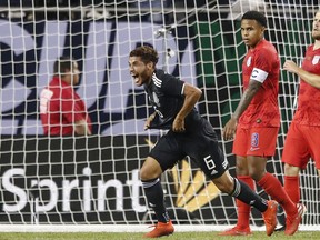 Mexico's midfielder Jonathan dos Santos, centre, celebrates after scoring against the United States during the second half of 2019 Concacaf Gold Cup final football match between USA and Mexico on July 7, 2019 at Soldier Field stadium in Chicago, Ill. (KAMIL KRZACZYNSKI/AFP/Getty Images)