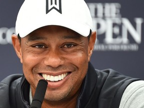 Tiger Woods takes part in a media conference at at Royal Portrush Golf Club on Tuesday.