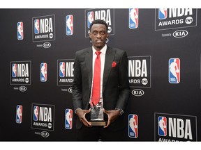 Toronto Raptors forward Pascal Siakam poses with his most improved player award at the 2019 NBA Awards show at Barker Hanger.