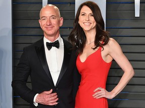 Jeff Bezos (L) and MacKenzie Bezos attend the 2018 Vanity Fair Oscar Party hosted by Radhika Jones at Wallis Annenberg Center for the Performing Arts on March 4, 2018 in Beverly Hills, Calif.