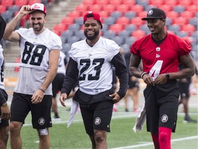 Ottawa Redblacks receiver Brad Sinopoli, running back Mossis Madu Jr., and quarterback Dominique Davis are all smiles during practice at TD Place on Friday, July 12, 2019. Errol McGihon/Postmedia