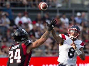 Ottawa Redblacks defensive-back Anthony Cioffi attempts to block a pass from Montreal Alouettes quarterback Vernon Adams Jr. during second half on July 13, 2019. The Alouettes defeated the RedBlacks 36-19.