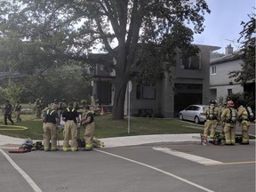 Ottawa Fire Services crews on the scene of a fire on Iona Street in Westboro on Sunday.