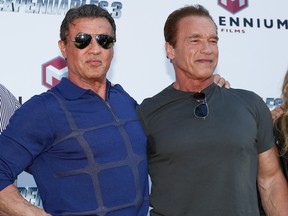 Sylvester Stallone, left, and Arnold Schwarzenegger attend "The Expendables 3" photocall during the 67th Annual Cannes Film Festival on May 18, 2014 in Cannes, France. (Andreas Rentz/Getty Images)