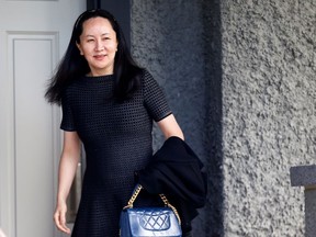 Huawei's financial chief, Meng Wanzhou, leaves her family home in Vancouver on May 8, 2019.