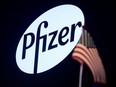 A logo for Pfizer is displayed on a monitor on the floor at the New York Stock Exchange (NYSE) in New York, U.S., July 29, 2019.