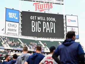 The Minnesota Twins and Boston Red Sox observe a moment of silence before the game for former player David Ortiz on June 17, 2019 at Target Field in Minneapolis. (Hannah Foslien/Getty Images)