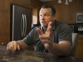 New Ottawa Senators head coach D.J. Smith sits down with Bruce Garrioch in the kitchen of his home in Tecumseh, Ont., on Tuesday. (DAX MELMER/POSTMEDIA NETWORK)