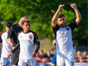 Ottawa Fury FC midfielder Thiago De Freitas (19) gives the thumbs up to the bench after scoring one of his two goals in Halifax.