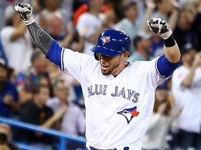 Eric Sogard of the Toronto Blue Jays scores the game winning run on a single by Justin Smoak in the tenth inning during a MLB game against the Cleveland Indians at Rogers Centre on July 23, 2019, in Toronto.