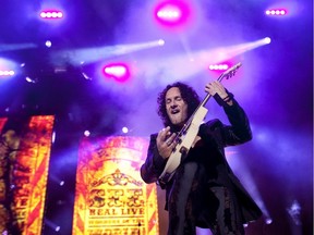 Def Leppard guitarist, Vivian Campbell on stage with the band in 2011