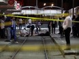 Authorities work at a scene after a man reported to be wearing an explosive belt died in the Intilaka area in Tunis, Tunisia July 2, 2019.