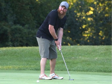 Craig Briscoe putts to win the Mens C division at the Ottawa Sun Scramble at the Marshes Golf Club on Saturday.