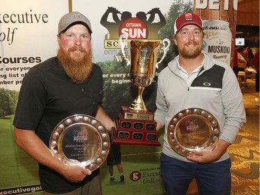 Craig Briscoe, left, and his partner Jacob Fulton pose for a photo after winning the Mens C division at the Ottawa Sun Scramble at the Marshes Golf Club on Saturday.