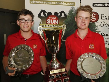 David Denis, left, and Ryan Baker winners of the Junior Championship pose for a photo at the Ottawa Sun Scramble at the Eagle Creek Golf Club on Sunday.