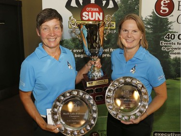 Lise Proulx, left, and Lori Strike winners of the Ladies B Championship pose for a photo at the Ottawa Sun Scramble at the Eagle Creek Golf Club on Sunday.