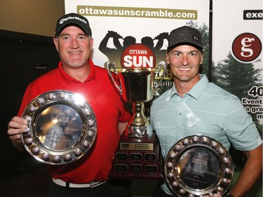 Daren Sedore, left, and Darren Campbell winners of the A Division Championship pose for a photo at the Ottawa Sun Scramble at the Eagle Creek Golf Club on Sunday.