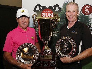 Graham Gunn, left, and Stan Hogan winners of the Senior Championship pose for a photo at the Ottawa Sun Scramble at the Eagle Creek Golf Club on Sunday.