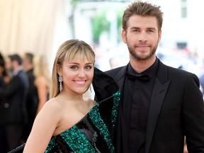 Miley Cyrus and Liam Hemsworth are separating after less than a year of marriage, according to People. Miley Cyrus and Liam Hemsworth attend The 2019 Met Gala Celebrating Camp: Notes on Fashion at Metropolitan Museum of Art on May 6, 2019 in New York City. (Dimitrios Kambouris/Getty Images)