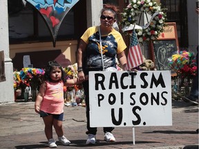 Anti-Trump demonstrators protest in the Oregon District, where a mass shooting early Sunday morning left nine dead and 27 wounded, on August 07, 2019 in Dayton, Ohio.