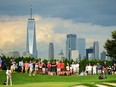 Dustin Johnson attempts a putt on the 18th green during the second round of The Northern Trust at Liberty National Golf Club on August 9, 2019 in Jersey City, N.J. (Jared C. Tilton/Getty Images)