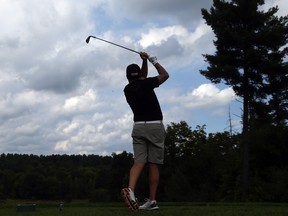 Craig Alexander his tee shot on the 9th hole at Le Sorcier Golf Club during the Sun Scramble, August 20, 2019.   Photo by Jean Levac/Postmedia 2