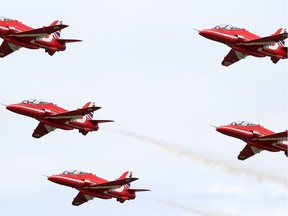 The Royal Air Force Red Arrows in formation as they arrive at the Gatineau Airport in advance of their performance in the city on Tuesday.