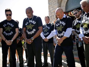 People gather during a tribute to the victims of a mass shooting at a Walmart store in El Paso, Texas, U.S., August 18, 2019.