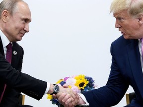 US President Donald Trump attends a meeting with Russia's President Vladimir Putin during the G20 summit in Osaka on June 28, 2019.