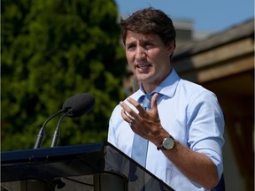 Prime Minister Justin Trudeau speaks about a report that he breached ethics rules by trying to influence a corporate legal case, at the Niagara-on-the Lake Community Centre on Aug. 14, 2019.