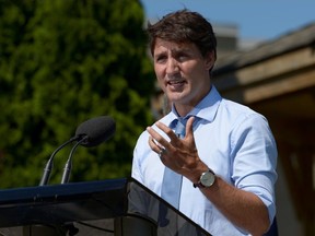 Prime Minister Justin Trudeau speaks about a watchdog's report that he breached ethics rules by trying to influence a corporate legal case, at the Niagara-on-the Lake Community Centre in Niagara-on-the-Lake, Ont., Aug. 14, 2019.