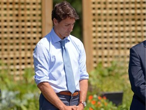 Prime Minister Justin Trudeau waits to be introduced before speaking  about a watchdog's report that he breached ethics rules by trying to influence a corporate legal case regarding SNC-Lavalin, in Niagara-on-the-Lake, Ont., on Wednesday, Aug. 14, 2019.