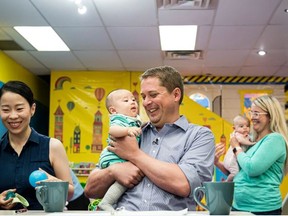 Conservative Leader Andrew Scheer stopped by a Toronto play centre on Aug. 20 to announce that if elected, his government will not tax the income of parents who take maternity leave. (The Canadian Press)