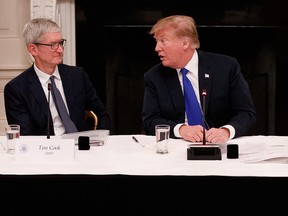 U.S. President Donald Trump and Apple CEO Tim Cook are seen in this March 6, 2019, file photo.