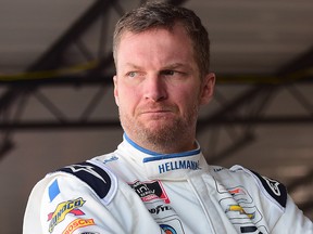 Dale Earnhardt Jr. stands in the garage area during practice for the NASCAR Xfinity Series Sport Clips Haircuts VFW 200 at Darlington Raceway on August 30, 2019 in Darlington, S.C. (Jared C. Tilton/Getty Images)