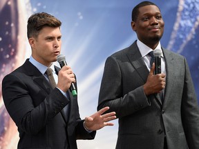 Presenters Colin Jost and Michael Che roll out the gold carpet for the 70th Emmy Awards at Microsoft Theater on Sept. 13, 2018, in Los Angeles.