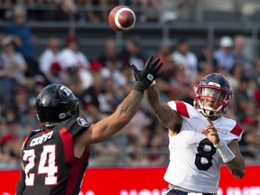 Ottawa Redblacks defensive back Anthony Cioffi (8) attempts to block a pass from Montreal Alouettes quarterback Vernon Adams Jr. on July 13, 2019. The Alouettes defeated the RedBlacks 36-19.