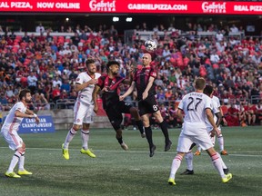 Midfielder Jeremy Gagnon-Lapare goes up for a ball during Fury FC’s Canadian Championship first-leg semifinal match against Toronto FC last night at TD Place Stadium. (Steve Kingsman/Freestyle Photography for Ottawa Fury FC)