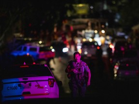 A police officer leaves the scene of the investigation following a deadly shooting at the Gilroy Garlic Festival in Gilroy, 80 miles south of San Francisco, Calif., on July 28, 2019. (PHILIP PACHECO/AFP/Getty Images)