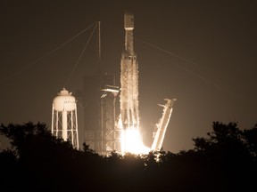 In this handout image provided by NASA, A SpaceX Falcon Heavy rocket carrying 24 satellites as part of the Department of Defense's Space Test Program-2 (STP-2) mission launches from Launch Complex 39A, Tuesday, June 25, 2019 at NASA's Kennedy Space Center in Florida.