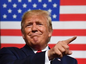 US President Donald Trump speaks during a "Keep America Great" campaign rally at the SNHU Arena in Manchester, New Hampshire, on August 15, 2019.