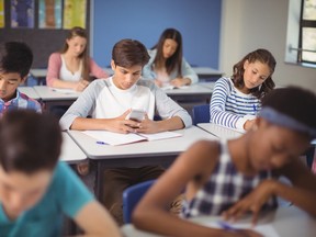 The provincial government is implementing a restricted-use policy for cellphones in Ontario classrooms.