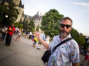 Tom Green organized a picnic to get people to come out and show their support and voice their opinion against the Château Laurier renovation on Saturday, July 27, 2019, in Major's Hill Park.    Ashley Fraser/Postmedia