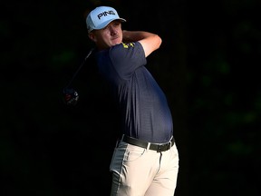 Mackenzie Hughes plays his shot from the second tee during the first round of the Wyndham Championship at Sedgefield Country Club on August 01, 2019 in Greensboro. (Jared C. Tilton/Getty Images)