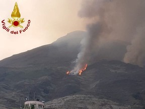 Smoke rises from a volcano on the island of Stromboli after an explosion in Stromboli, Italy, in this handout picture released on August 28, 2019.