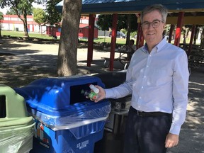 A tweeted photo by Mayor Jim Watson: 'Lots of enthusiasm for the new green bins and recycling bins in Brewer Park.'