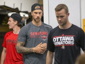 Goalie Anders Nilsson (C) waits for a drill as the Ottawa Senators begin training camp with medicals and fitness testing.