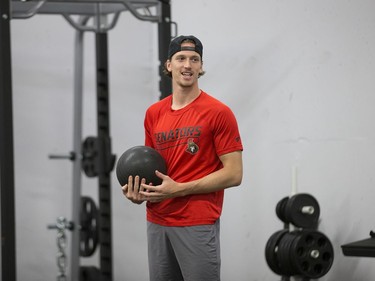 Thomas Chabot prepares to throw a medicine ball as the Ottawa Senators begin training camp with medicals and fitness testing.