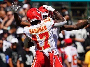 Kansas City Chiefs' Demarcus Robinson (back) celebrates a touchdown with Mecole Hardman during Sunday's win. (GETTY IMAGES)